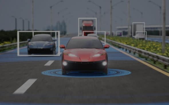 Autonomous cars driving on a highway with sensor detection.