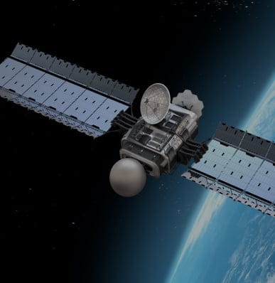 Satellite with solar panels orbiting Earth in space.