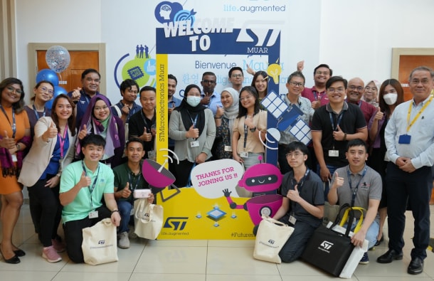 Group photo from ST's onboarding event in Muar facility